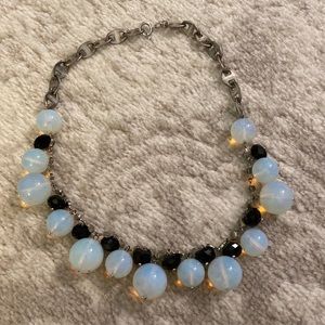 Adjustable necklace with black stones and iridescent balls